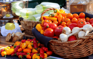 Basket of veggies on table