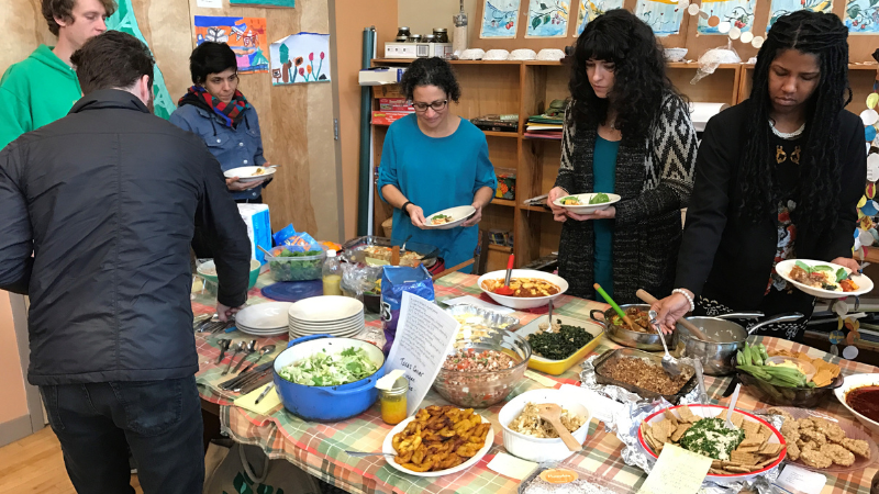 People serving themselves food