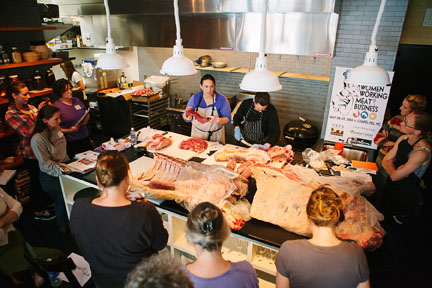 Workshop participants learn from Master Butcher Kari Underly. Credit: Briana Brough Photography
